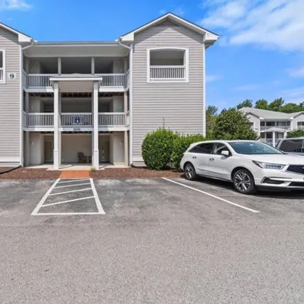 Rent this 1 bed condo on 2090 Marsh Winds Circle in St. James, NC 28461