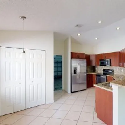 Rent this 2 bed apartment on 2098 Borealis Way in The Hammocks, Weston