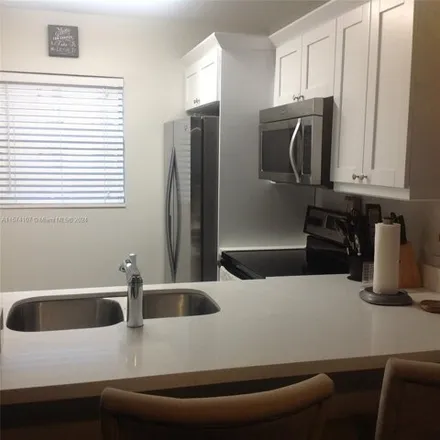 Rent this 1 bed condo on 5119 Northwest 34th Street in Lauderdale Lakes, FL 33319