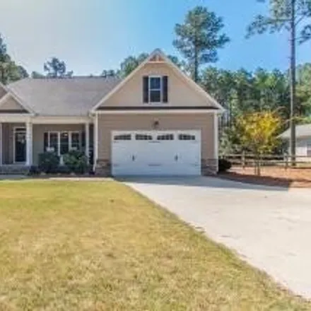 Rent this 4 bed house on 1215 Rays Bridge Road in Whispering Pines, Moore County