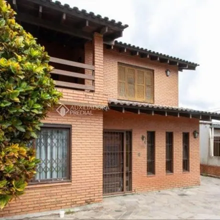 Rent this 3 bed house on Estrada Aracaju in Vila Nova, Porto Alegre - RS