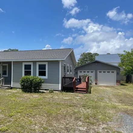 Buy this 2 bed house on 145 Northeast 33rd Street in Oak Island, Brunswick County