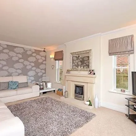 Rent this 4 bed apartment on 24 Strawberry Lane in Wilmslow, SK9 6AQ