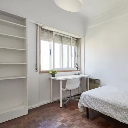 Rent this 8 bed room on Clube De Futebol "Os Torpedos" in Rua Sousa Loureiro, 1500-553 Lisbon