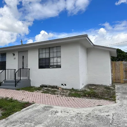 Rent this 3 bed house on 98 Gateway Boulevard in Boynton Beach, FL 33435
