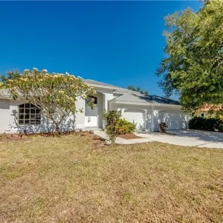 Buy this 4 bed house on 566 Chamonix Ave S in Lehigh Acres, Florida