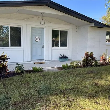 Buy this 2 bed house on 5349 Reef Drive in Elfers, FL 34652