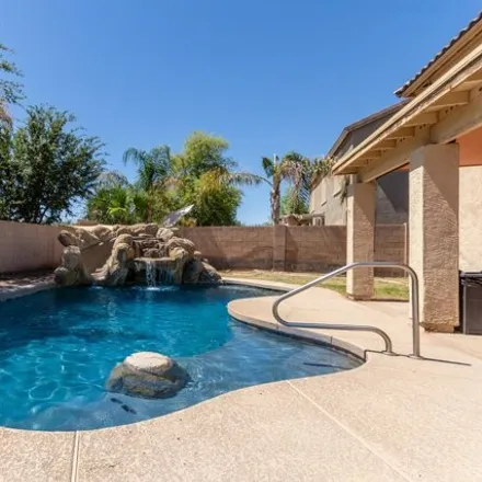 Buy this 5 bed house on West Cowpath Drive in Maricopa, AZ 85238