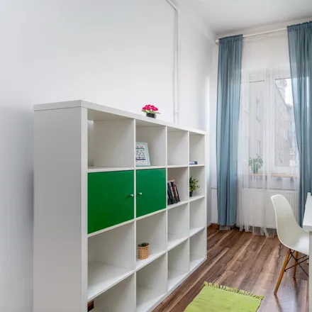 Rent this 5 bed room on Marshal Street 28 in 00-576 Warsaw, Poland