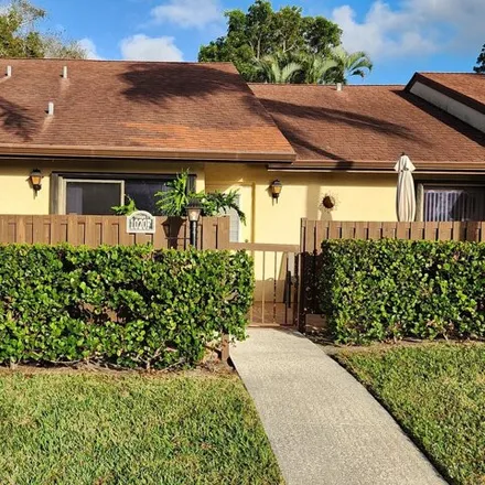 Buy this 2 bed house on Green Pine Boulevard in West Palm Beach, FL 33049