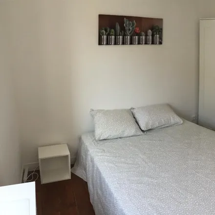 Rent this 4 bed room on Rua Capitão Renato Baptista 2-6 in 1150-334 Lisbon, Portugal