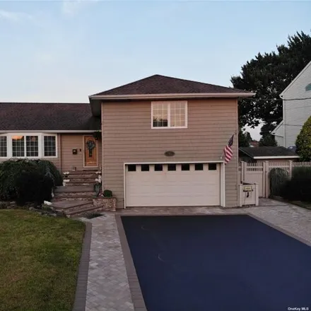 Buy this 4 bed house on 105 Ocean Ave in Massapequa, New York