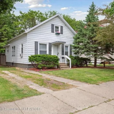 Buy this 2 bed house on 614 East Mount Hope Avenue in Lansing, MI 48910
