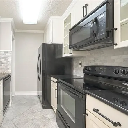 Rent this 2 bed condo on Westpark Drive in Houston, TX 77042