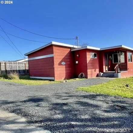 Buy this 3 bed house on Emmanuel Baptist Church of Coquille Oregon in West 6th Street, Coquille