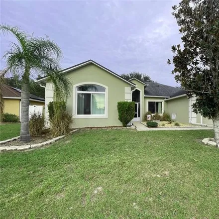 Buy this 4 bed house on 460 Acacia Tree Way in Poinciana, FL 34758