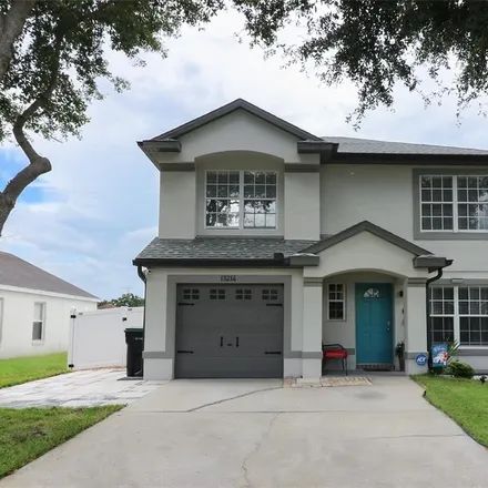 Buy this 4 bed house on 13214 Ashington Pointe Drive in Meadow Woods, Orange County