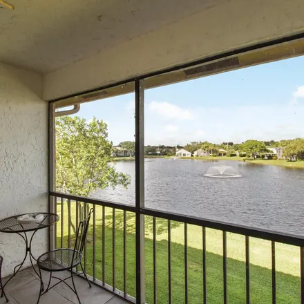 Rent this 2 bed apartment on 7086 Old Marsh Road in Palm Beach County, FL 33418