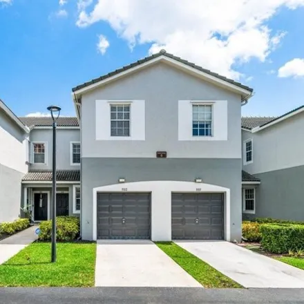 Buy this 3 bed townhouse on Grandiflori Drive in Park Pointe, Greenacres