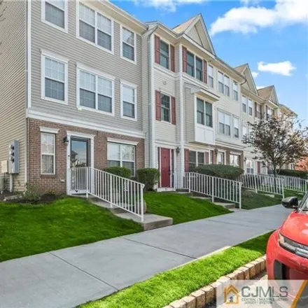 Buy this 3 bed townhouse on 23 Woodlake Drive in Sayreville, NJ 08859