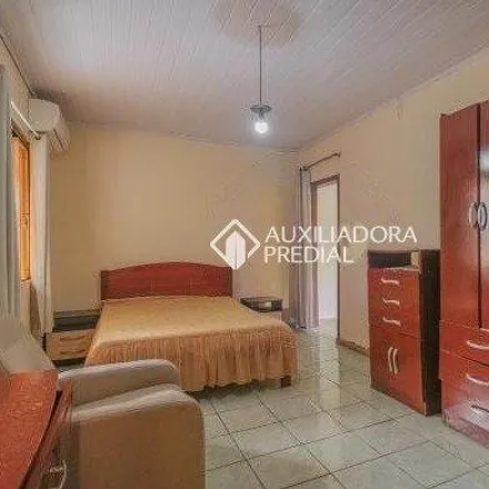 Buy this 4 bed house on Rua 19 de Abril in Jardim Sabará, Porto Alegre - RS