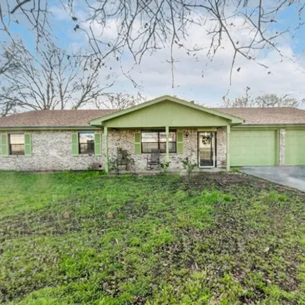 Buy this 4 bed house on 719 North Travis Street in De Leon, TX 76444