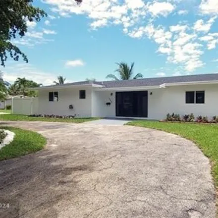 Rent this 3 bed house on 1414 Southeast 8th Avenue in Shorewood, Deerfield Beach