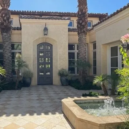 Rent this 5 bed house on 52789 Claret Cove in La Quinta, CA 92253
