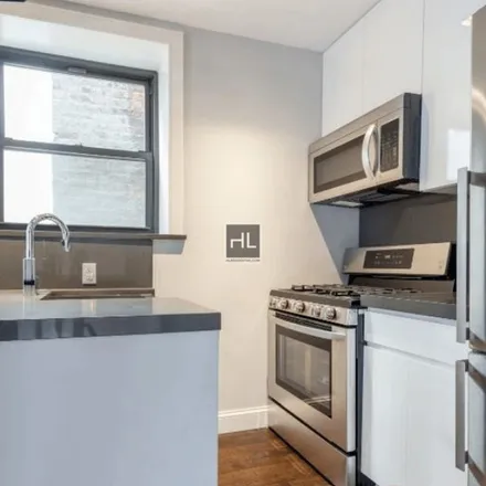 Rent this 4 bed apartment on 349 East 118th Street in New York, NY 10035