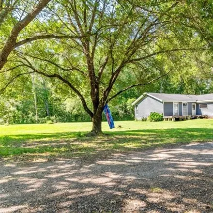 Buy this 4 bed house on 21752 Carol Road in Montgomery County, TX 77357