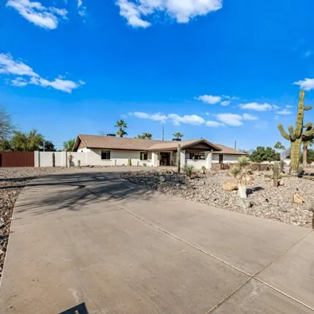 Buy this 4 bed house on 6338 East Clinton Street in Scottsdale, AZ 85254