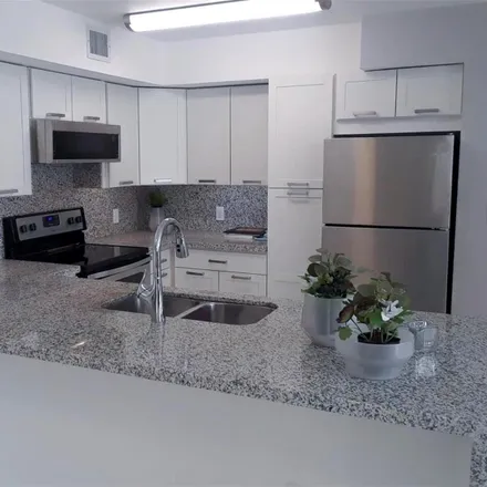 Rent this 2 bed apartment on Northwest 107th Avenue in Doral, FL 33178