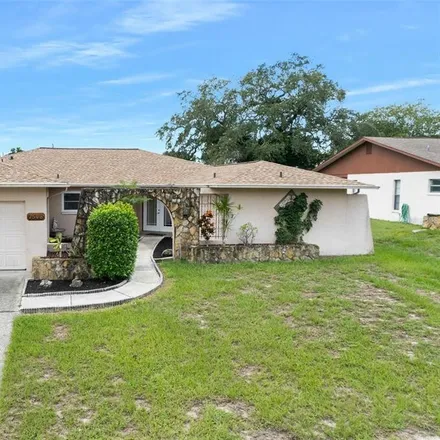 Buy this 3 bed house on 7548 High Pines Court in Jasmine Estates, FL 34668
