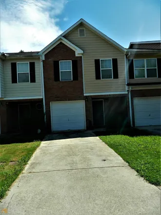 Rent this 3 bed townhouse on 401 Magnolia Gardens Walk in McDonough, GA 30253