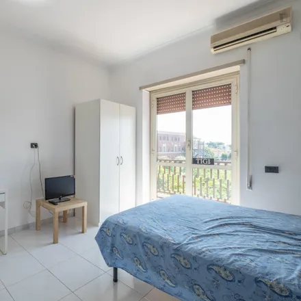 Rent this 3 bed room on Via Beniamino Costantini in 00177 Rome RM, Italy