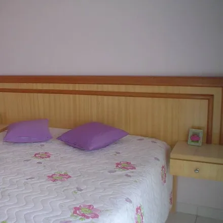 Rent this 4 bed apartment on Praia Grande in Região Metropolitana da Baixada Santista, Brazil