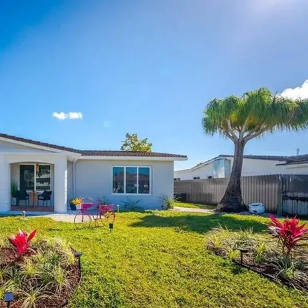 Rent this 3 bed house on 4500 Southwest 43rd Avenue in Playland Isles, Dania Beach