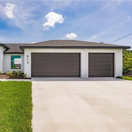 Buy this 3 bed house on 667 Northwest 7th Place in Cape Coral, FL 33993