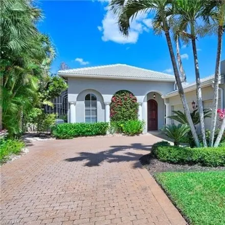 Buy this 3 bed house on The Club at Olde Cypress in 7165 Treeline Drive, East Naples