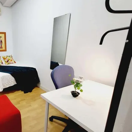Rent this 11 bed room on Gran Vía in 71, 28013 Madrid