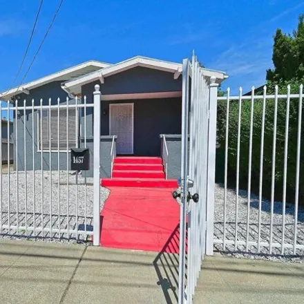 Buy this 2 bed house on 1457 78th Avenue in Oakland, CA 94621