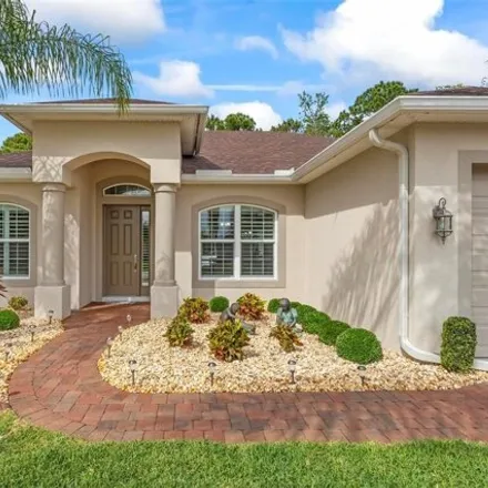 Buy this 3 bed house on Graham Woods Place in Palm Coast, FL 32164