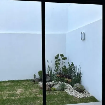 Buy this 4 bed house on Calle Sierra de Cardos in Parque Zacatecas, 72940 Santa Clara Ocoyucan