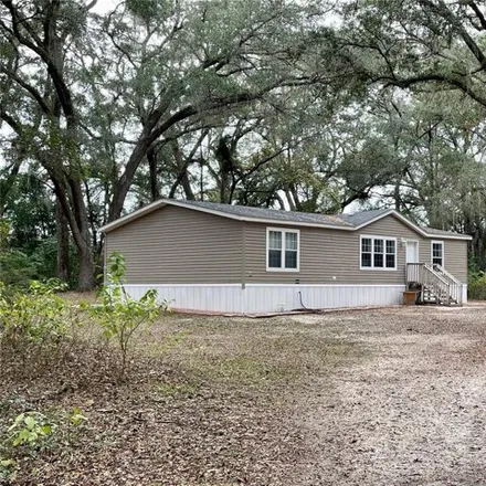 Buy this studio apartment on 11636 Nw 161st St in Alachua, Florida