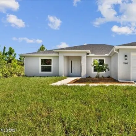 Buy this 5 bed house on 2717 Rockford Avenue Southeast in Palm Bay, FL 32909