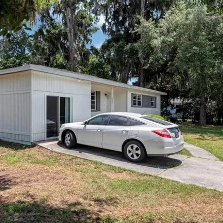 Buy this 4 bed house on 3501 Hawthorne Road in Alachua County, FL 32641