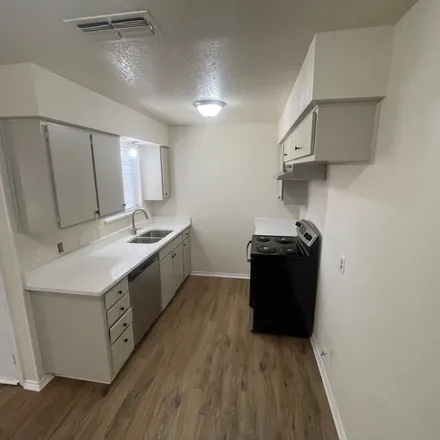 Rent this 2 bed apartment on 3161 Tudor Lane in Irving, TX 75060