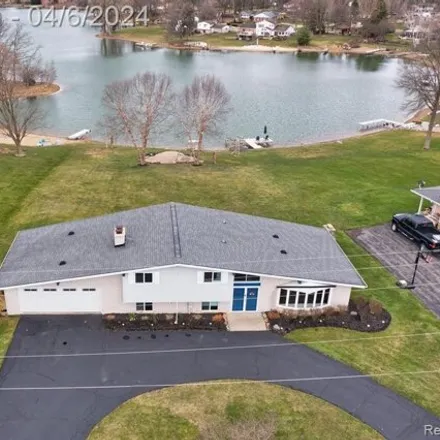 Buy this 2 bed house on 9265 Steep Hollow Drive in White Lake Charter Township, MI 48386