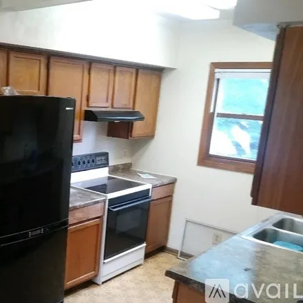 Rent this 2 bed apartment on 4627 N Colfax Ave