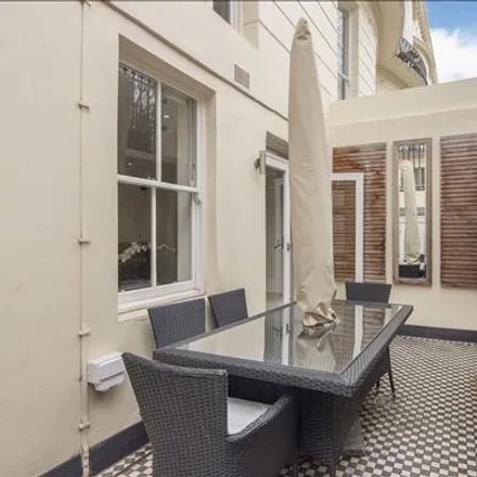 Rent this 3 bed room on Garden House in 86-92 Kensington Gardens Square, London